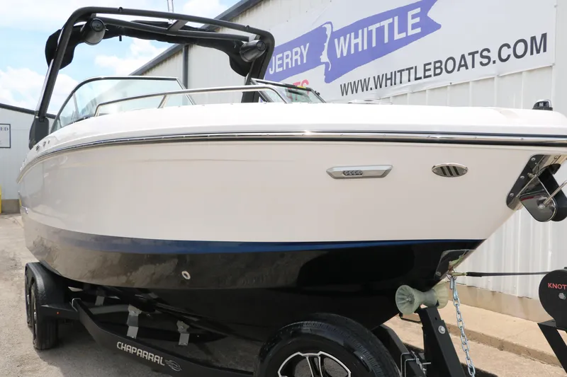 Slide: The Image of 2025 Chaparral 267 SSX boat on trailer at dealership, Jerry Whittle Boats. - 6