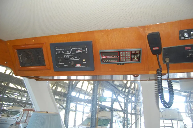 Slide: The Image of Control panel of 1983 Island Gypsy 36 Quad Cabin with radio and speaker. - 19