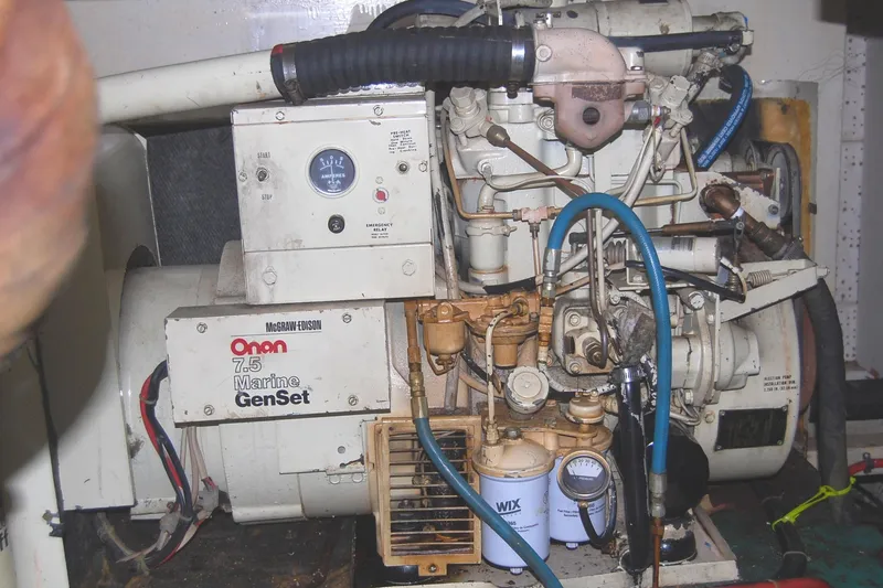 Slide: The Image of Onan 7.5 Marine GenSet engine in 1983 Island Gypsy 36 Quad Cabin. - 47