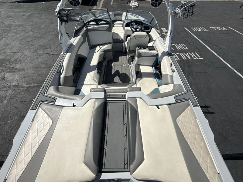 Slide: The Image of 2016 Tigé Z3 boat interior with spacious seating and modern design. - 19