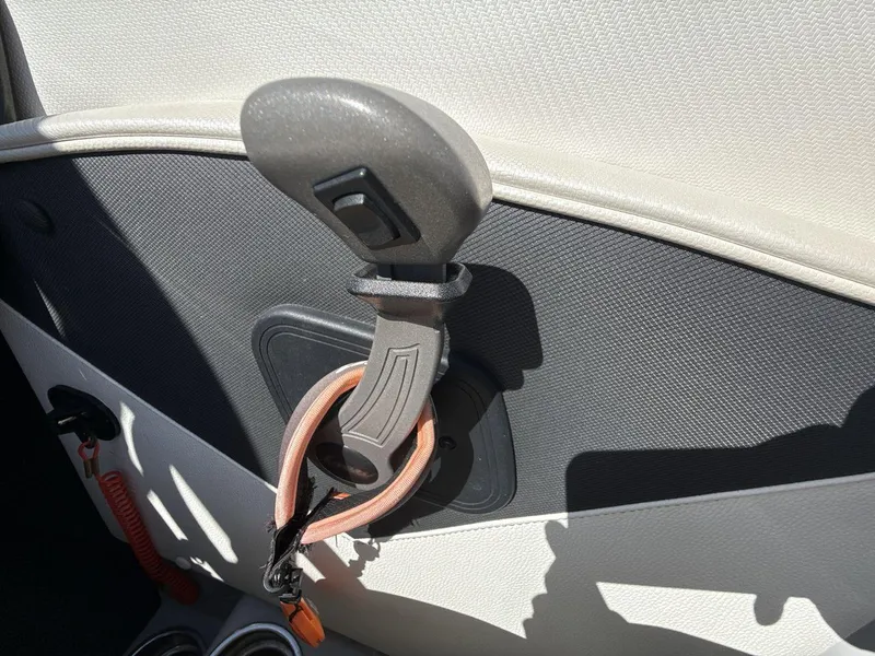 Slide: The Image of 2016 Tigé Z3 boat interior with a mounted hook and strap. - 26