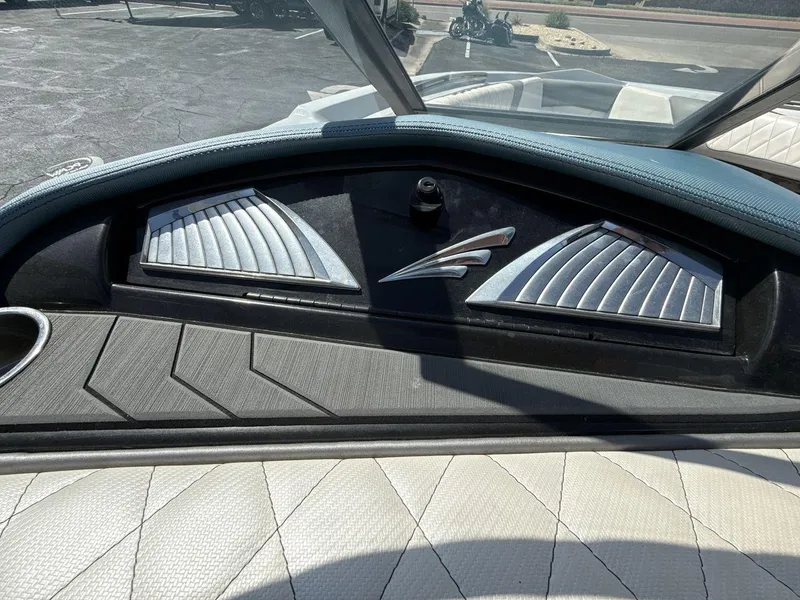 Slide: The Image of 2016 Tigé Z3 boat dashboard with sleek design and modern controls. - 28