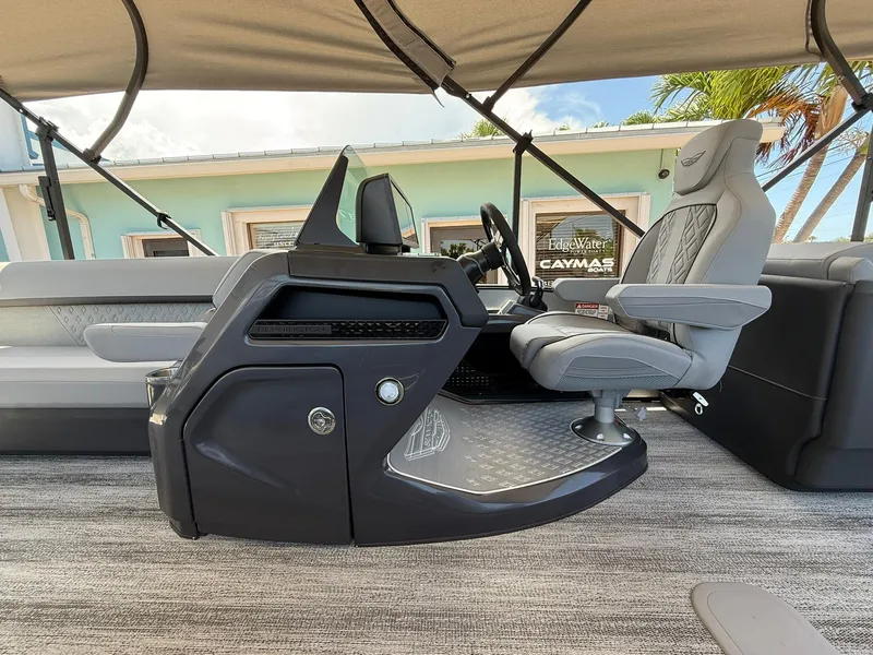 Slide: The Image of 2026 Bennington 26 MFB boat interior with modern helm and seating. - 12