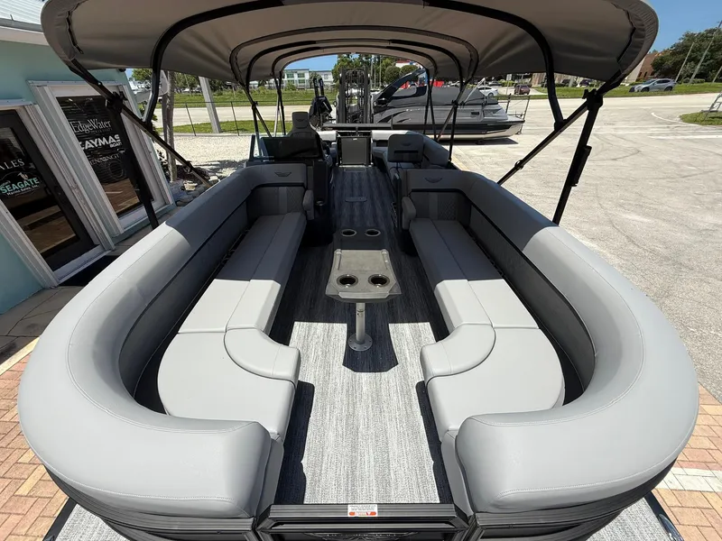 Slide: The Image of 2026 Bennington 26 MFB pontoon boat with spacious seating and modern design. - 23