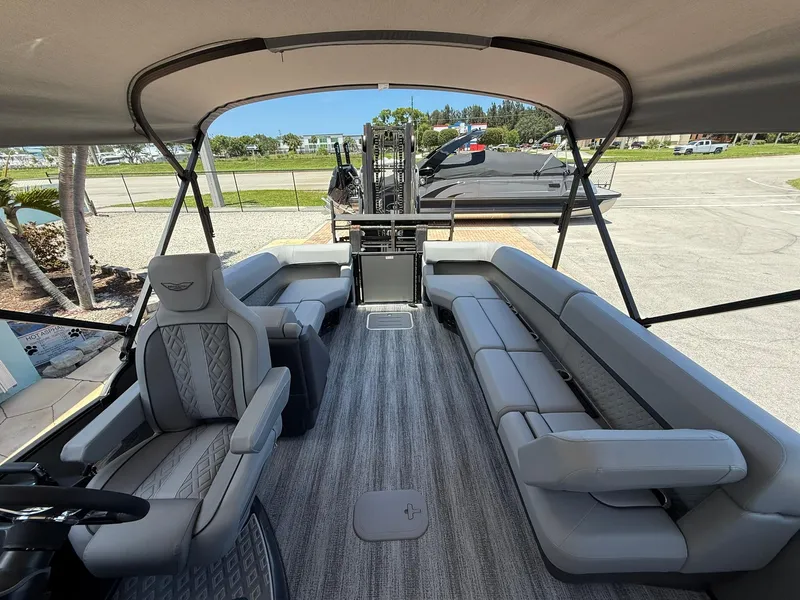 Slide: The Image of 2026 Bennington 26 MFB boat interior with spacious seating and modern design. - 9