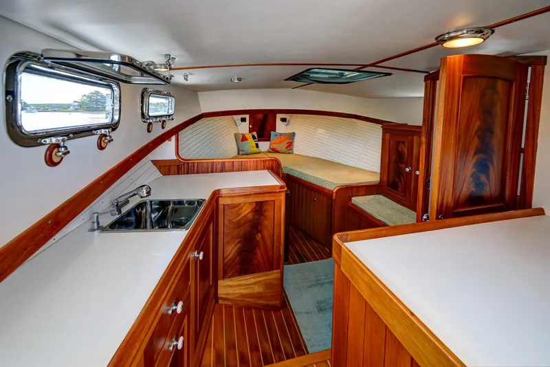 Slide: The Image of Luxurious 2008 Holland Open yacht interior with wood finish and modern amenities. - 15
