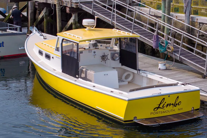 Slide: The Image of Yellow 2008 Holland Open boat docked in Portsmouth, NH. - 3
