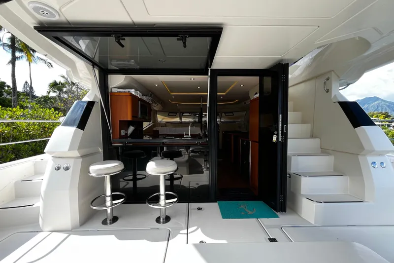 Slide: The Image of Luxurious 2016 Aquila 44 yacht interior with bar stools and modern design. - 18