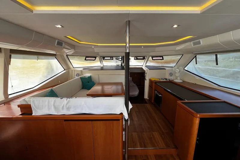 Slide: The Image of Luxurious interior of 2016 Aquila 44 yacht with modern furnishings and panoramic windows. - 21