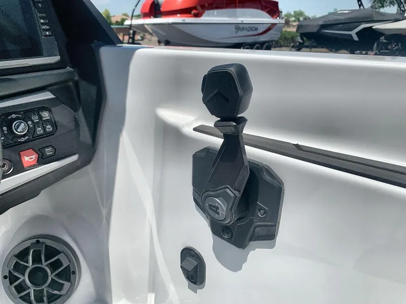 Slide: The Image of Interior of 2022 Axis A20 boat showing control panel and speaker. - 16