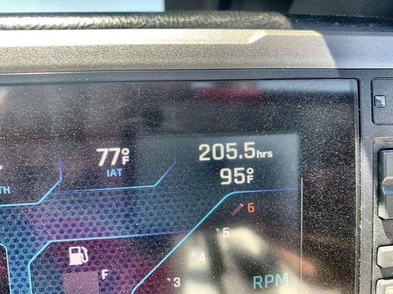 Slide: The Image of Dashboard display of a 2022 Axis A20 showing 205.5 hours and temperature readings. - 23