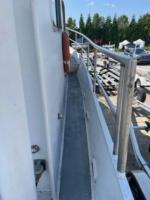 Slide: The Image of 1989 Maritime 340 Trawler side deck with railing and life preserver. - 3