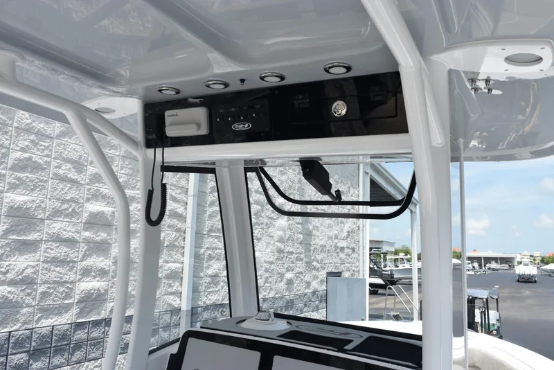 Slide: The Image of 2026 Sea Hunt Ultra 255 SE boat console with modern controls and sleek design. - 12