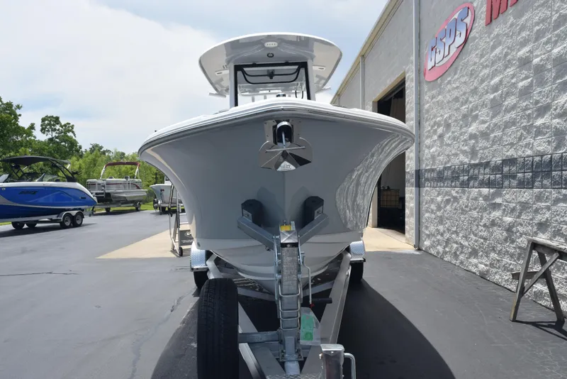Slide: The Image of 2026 Sea Hunt Ultra 255 SE boat on trailer, parked outside dealership. - 3