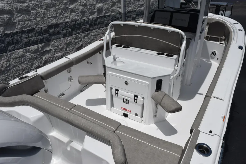 Slide: The Image of 2026 Sea Hunt Ultra 255 SE boat interior with seating and Yamaha cooler. - 8