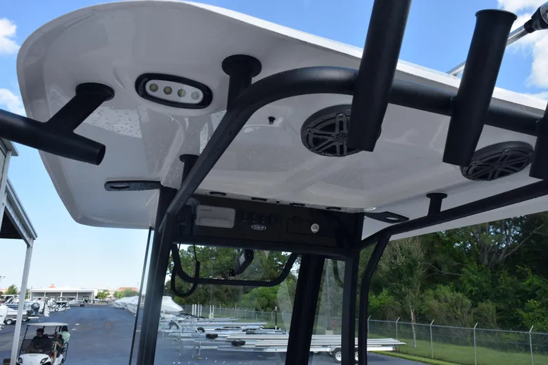 Slide: The Image of 2026 Sea Hunt BX 25 FS boat's T-top with speakers and lights. - 10