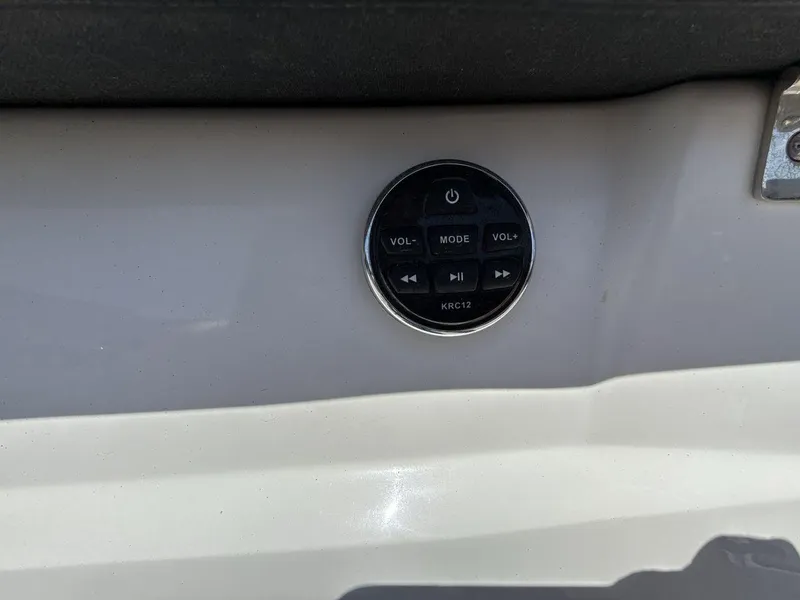 Slide: The Image of Control panel on a 2022 Glastron GTD 245 boat dashboard. - 25