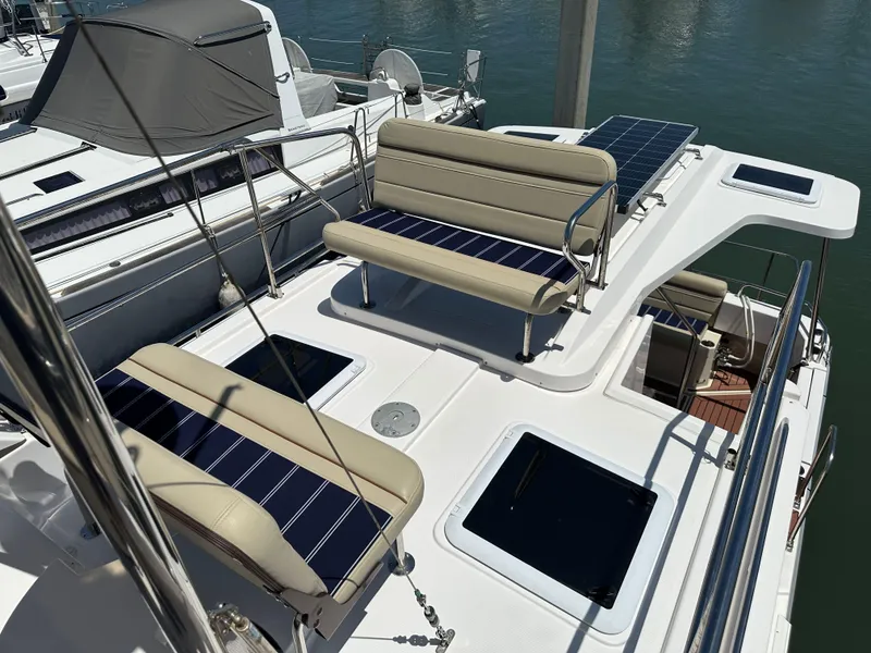 Slide: The Image of 2023 Ranger Tugs R-31 CB boat with solar panels and seating on deck. - 28