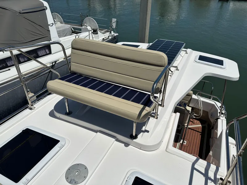 Slide: The Image of 2023 Ranger Tugs R-31 CB boat with rooftop seating and solar panels. - 29