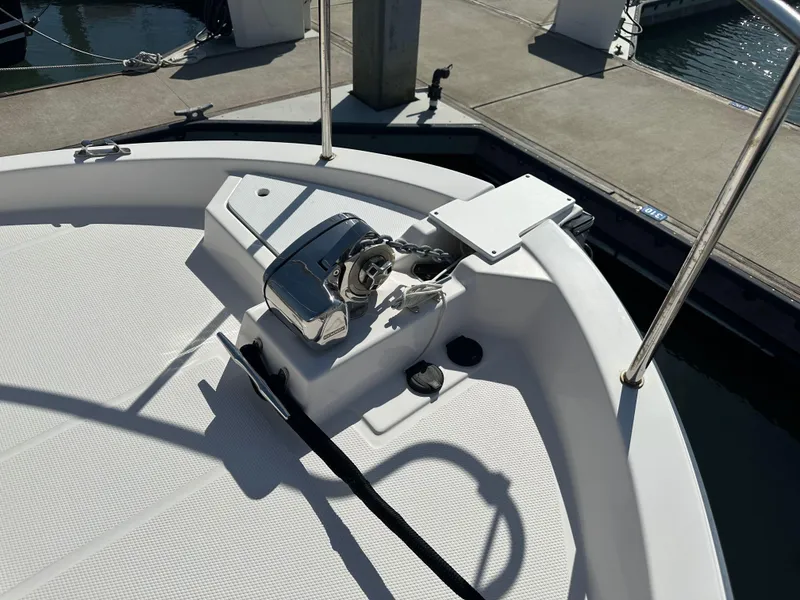 Slide: The Image of 2023 Ranger Tugs R-31 CB boat deck with anchor system at marina. - 34