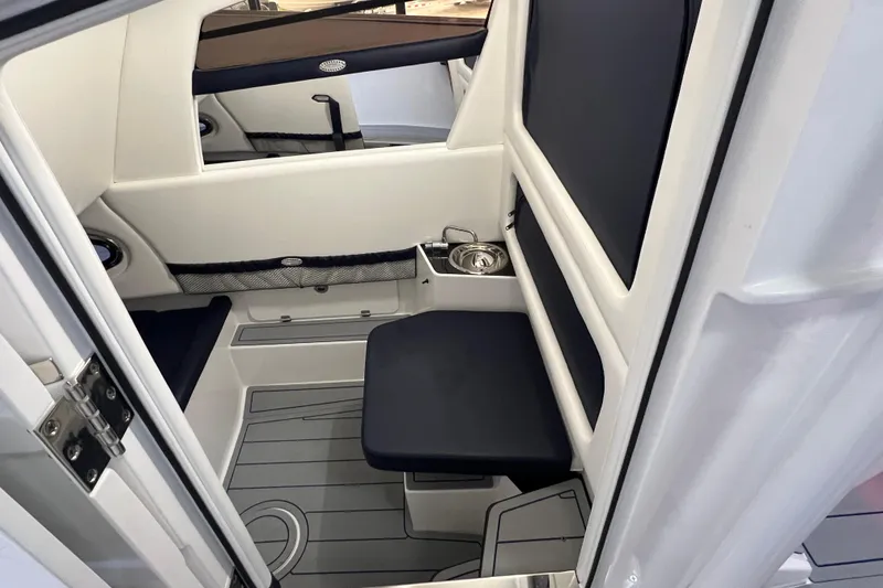 Slide: The Image of 2026 Nor-Tech 340 Sport dashboard with advanced touchscreen controls and sleek steering wheel design. - 15