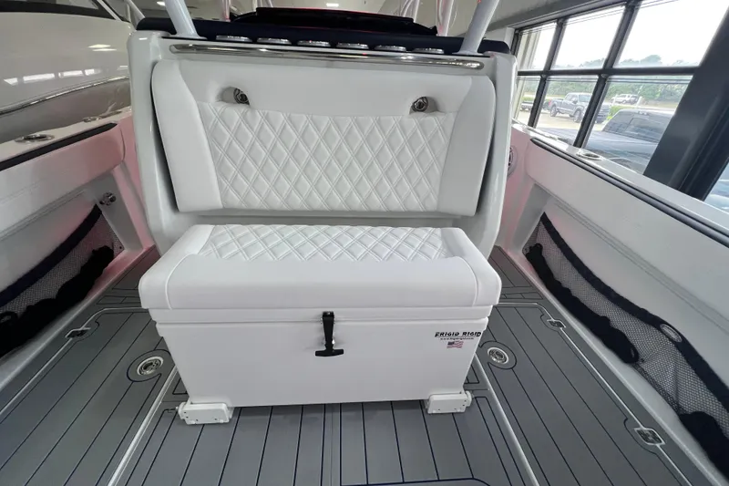 Slide: The Image of Interior of 2026 Nor-Tech 340 Sport boat, featuring sleek seating and modern design elements. - 16