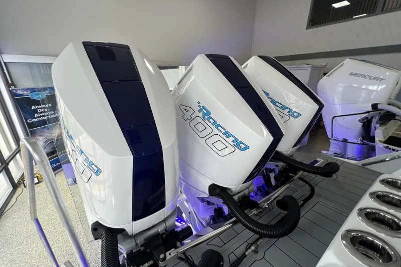 Slide: The Image of 2026 Nor-Tech 340 Sport boat interior with Mercury Racing 400 engine, featuring sleek design and luxury seating. - 24