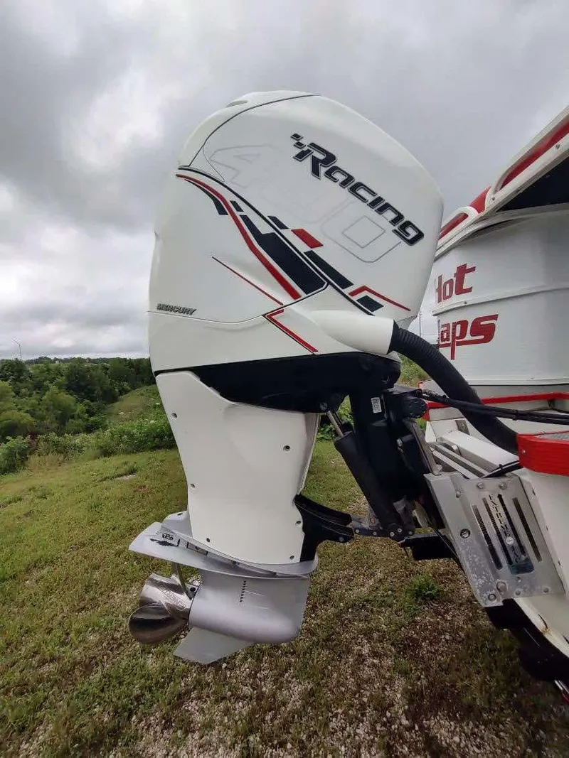 Slide: The Image of 2017 PlayCraft 2600 X-treme boat with a powerful racing outboard motor. - 17