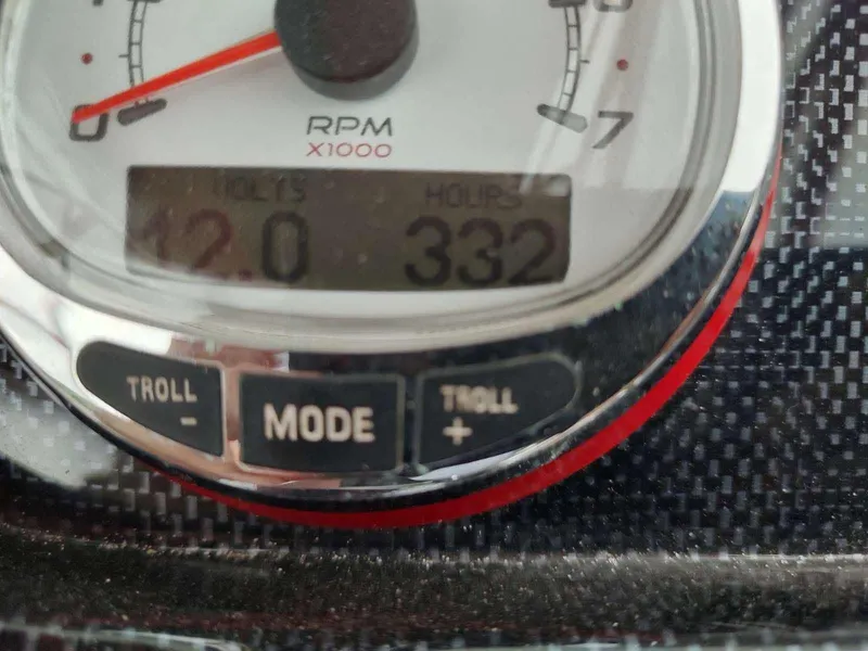 Slide: The Image of Close-up of PlayCraft 2600 X-treme 2017 boat tachometer showing 12 volts and 332 hours. - 9