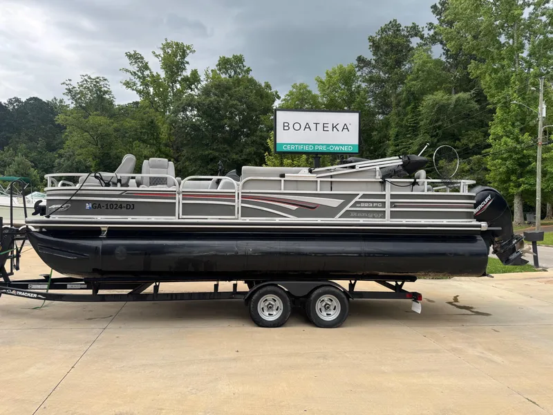 The Image of 2022 Ranger Reata 223FC pontoon boat on trailer at Boateka used boat dealership. - 0