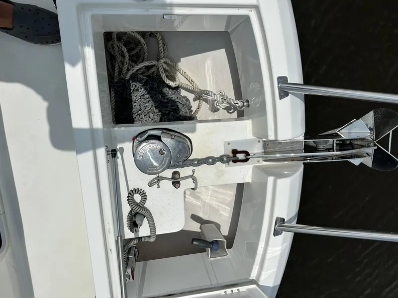 Slide: The Image of Anchor compartment of 2021 Beneteau GT 32 boat with ropes and chain. - 17