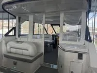 Slide: The Image of 2023 Regal 36 Grande Coupe interior with luxurious seating and modern design. - 10