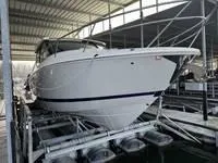 Slide: The Image of 2023 Regal 36 Grande Coupe docked, rear view, with "Vet My Boat" text. - 6