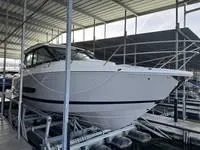 Slide: The Image of 2023 Regal 36 Grande Coupe docked in marina, rear view, Linn Creek, MO. - 7