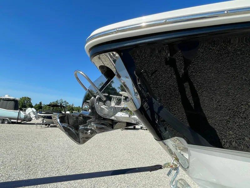 Slide: The Image of 2025 Chaparral 270 OSX boat anchor detail under clear blue sky. - 1