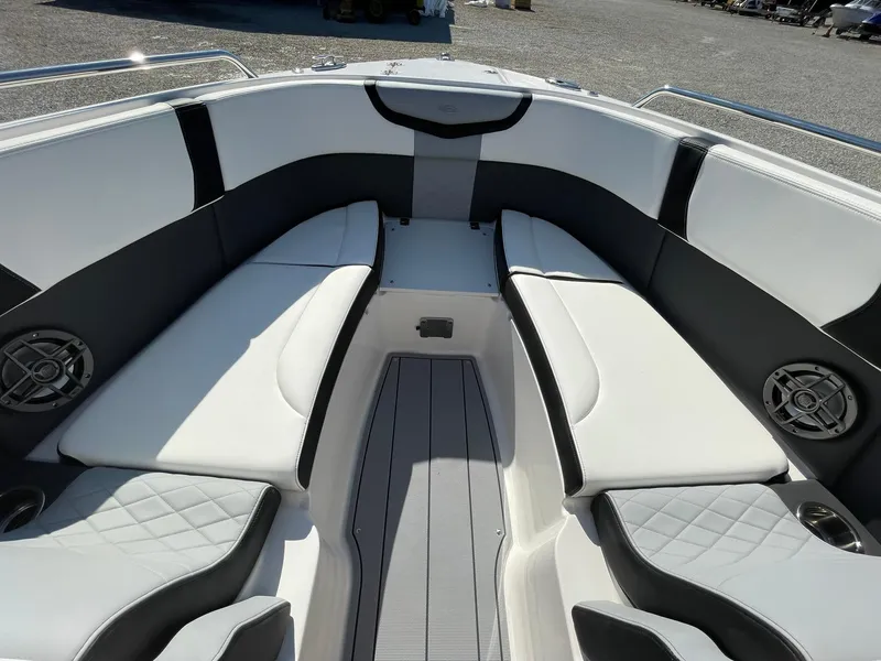 Slide: The Image of 2025 Chaparral 270 OSX boat interior with sleek seating and modern design. - 20