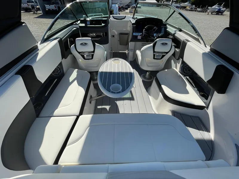 Slide: The Image of Storage compartment in 2025 Chaparral 270 OSX boat with metal components. - 28