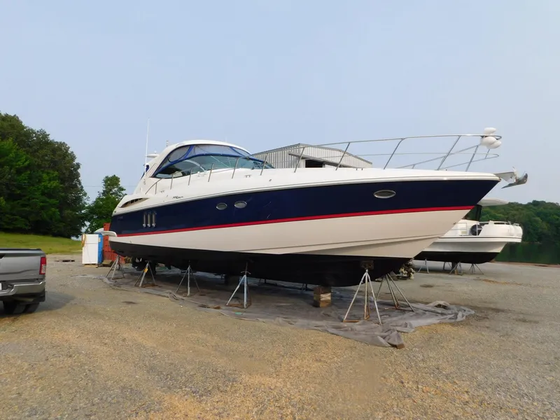 Slide: The Image of 2005 Cruisers Yachts 500 Express on stands, ready for maintenance. - 5