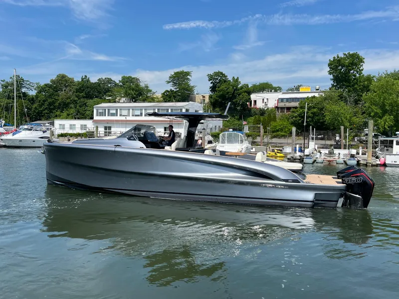 The Image of 2024 Solaris Power 40F Open yacht docked in a marina, sleek design, sunny day. - 0