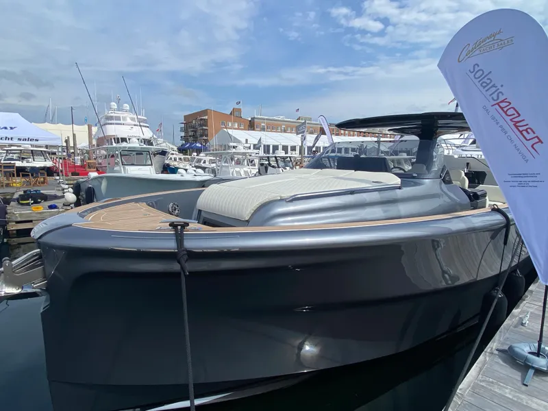 Slide: The Image of 2024 Solaris Power 40F Open yacht docked at marina, showcasing sleek design and luxury features. - 20
