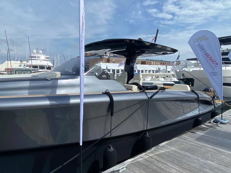 Slide: The Image of 2024 Solaris Power 40F Open yacht docked at marina under clear sky. - 22