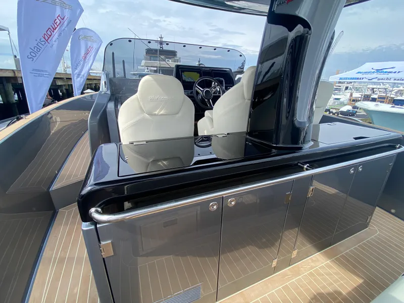 Slide: The Image of 2024 Solaris Power 40F Open yacht cockpit with sleek design and modern controls. - 29
