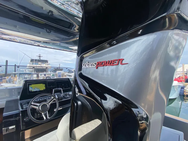 Slide: The Image of 2024 Solaris Power 40F Open yacht interior with steering wheel and control panel. - 30