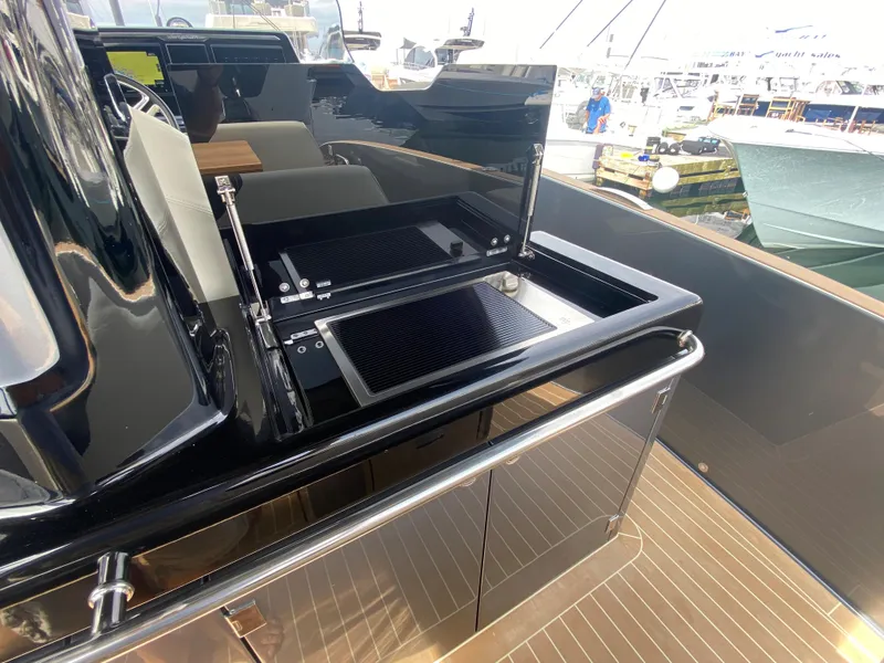 Slide: The Image of Outdoor kitchen on 2024 Solaris Power 40F open yacht with grill and sink. - 32