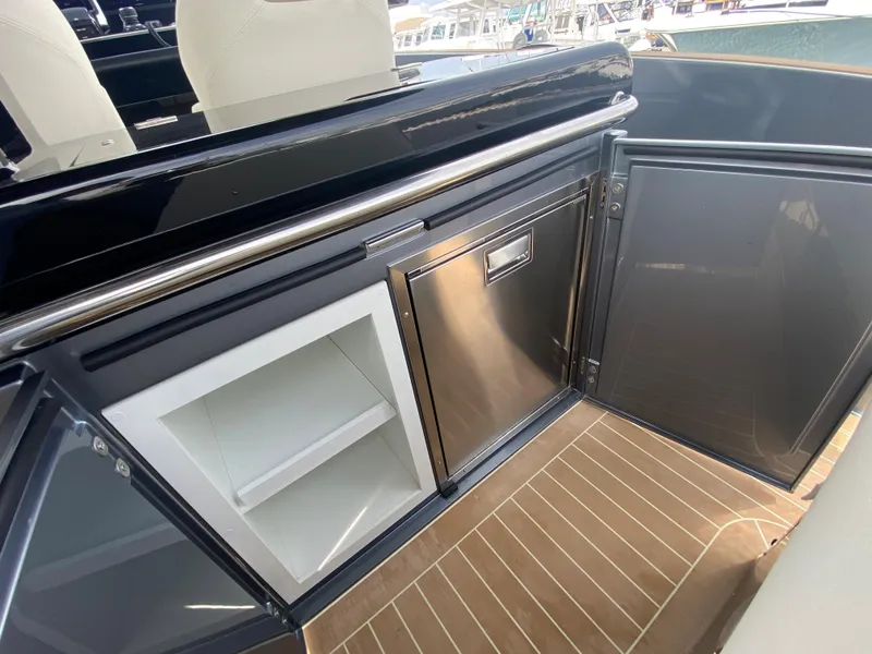 Slide: The Image of 2024 Solaris Power 40F open yacht interior with sleek cabinetry and modern design. - 34