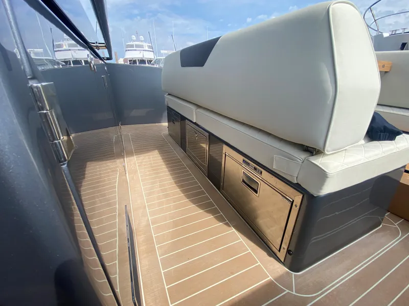 Slide: The Image of 2024 Solaris Power 40F Open yacht interior with sleek seating and storage. - 36