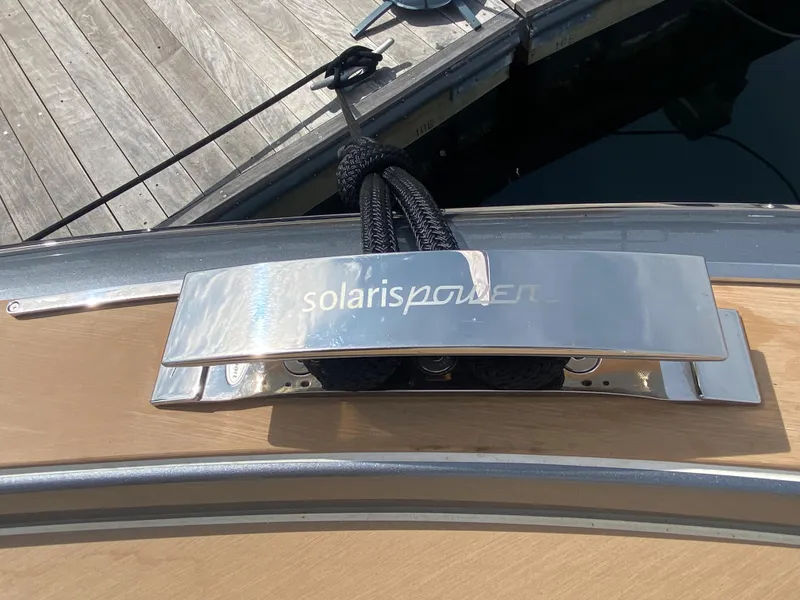 Slide: The Image of 2024 Solaris Power 40F Open yacht cleat with logo, docked at marina. - 43