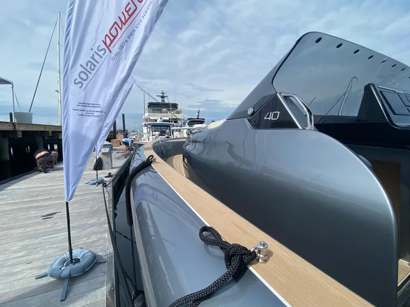 Slide: The Image of 2024 Solaris Power 40F Open yacht docked, showcasing sleek design and modern features. - 45
