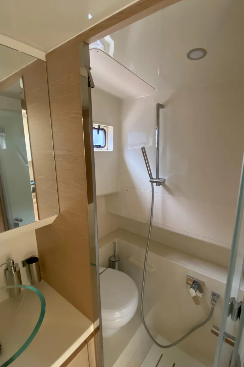 Slide: The Image of 2024 Solaris Power 40F Open yacht bathroom with modern fixtures and glass sink. - 49