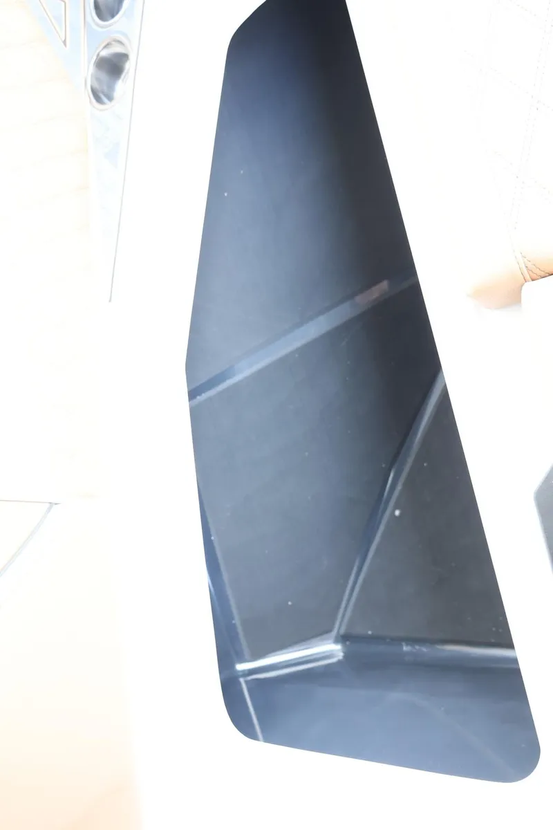 Slide: The Image of 2025 Tigé 24RZX boat interior detail with sleek design elements. - 18